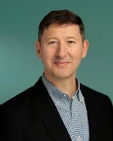 CHRIS STUBBS, Senior Vice President, Enterprise Business Model Strategy